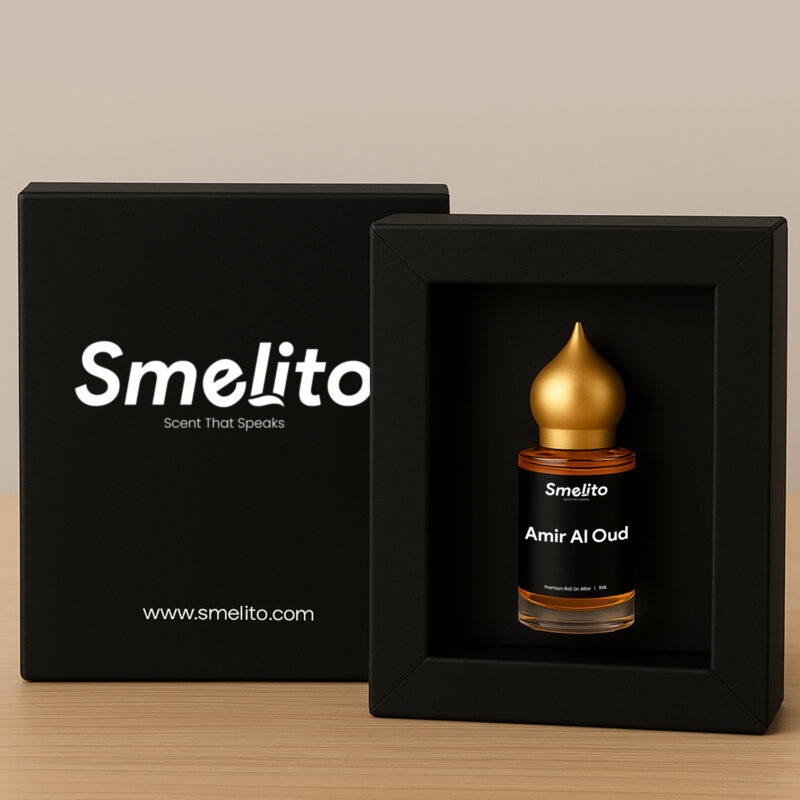 Bottle inside open box (lifestyle image) Smelito Amir Al Oud Attar in luxury packaging – open box lifestyle image showing premium perfume presentation