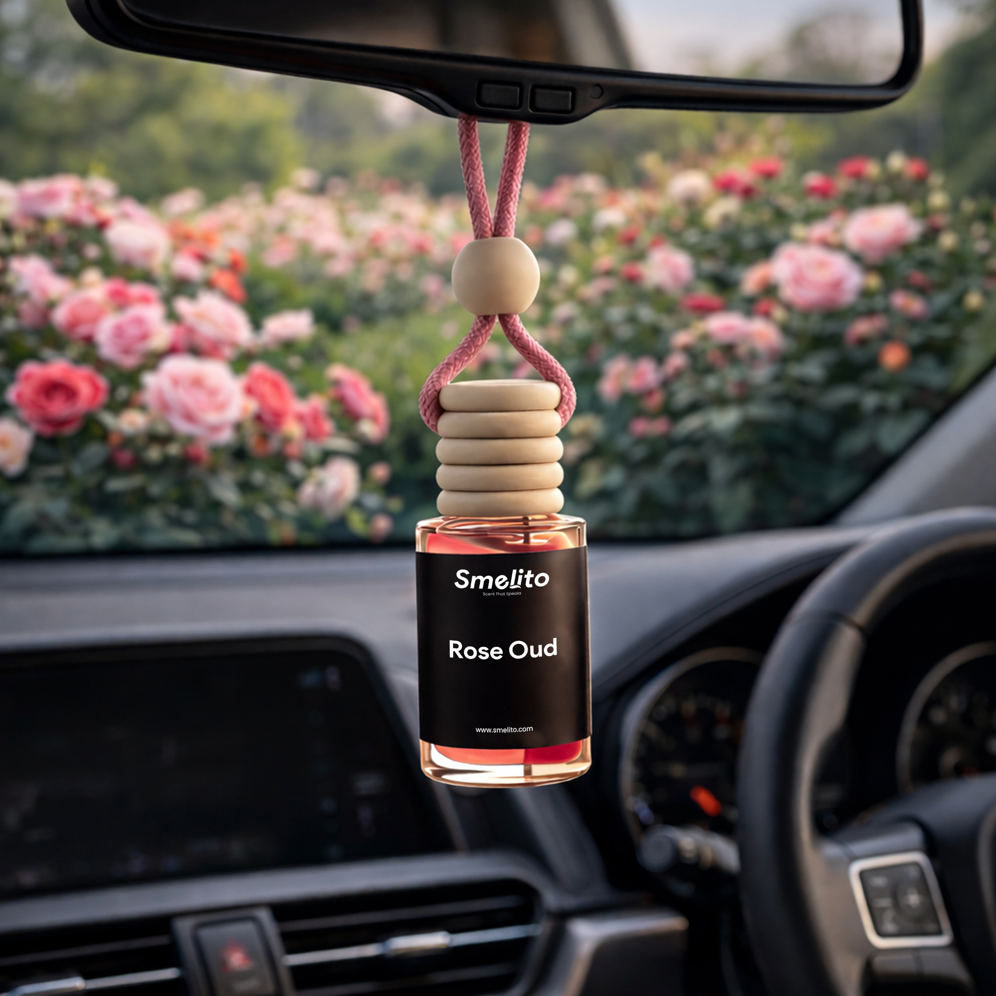 smelito rose oud car perfume hanging inside car interior